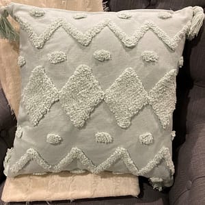Mint green cushion with feather filled insert