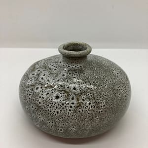 Ceramic squat vase in a green/grey finish